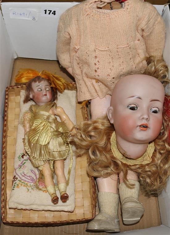 A Simon & Halbig bisque head doll, no.117 and a Kamer & Reinhardt doll, 23cm